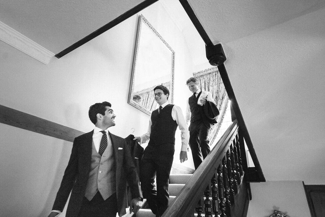 the groom and ushers leave for the ceremony at Holy Trinity