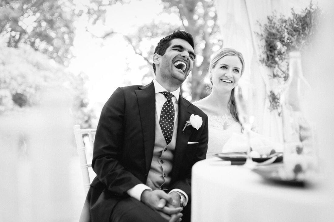 the groom reacts to the best man's speech