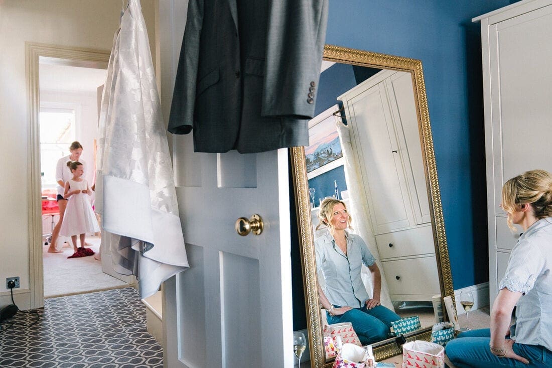 bride and her daughter getting ready for the wedding