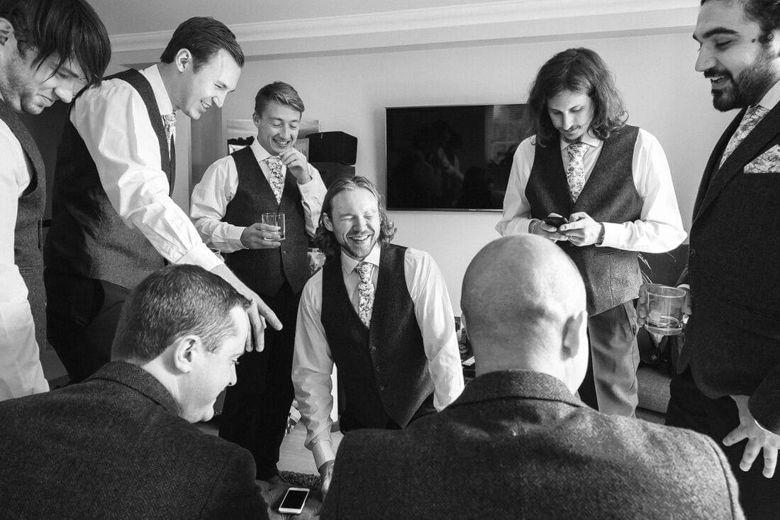 the groom and his ushers make final preparations 