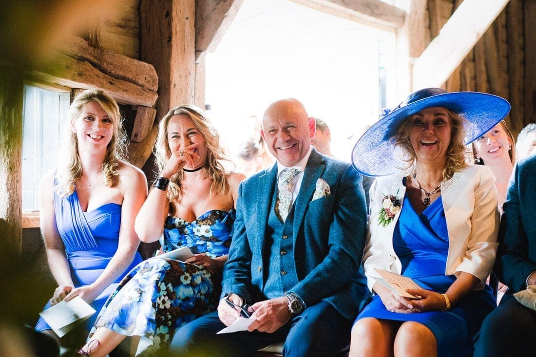 laughter during the wedding at high billinghurst farm in surrey