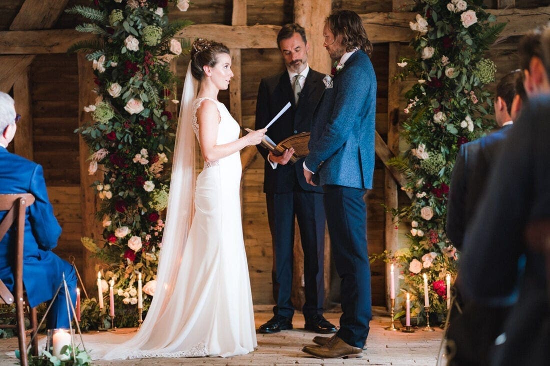 the bride and groom exchange vows