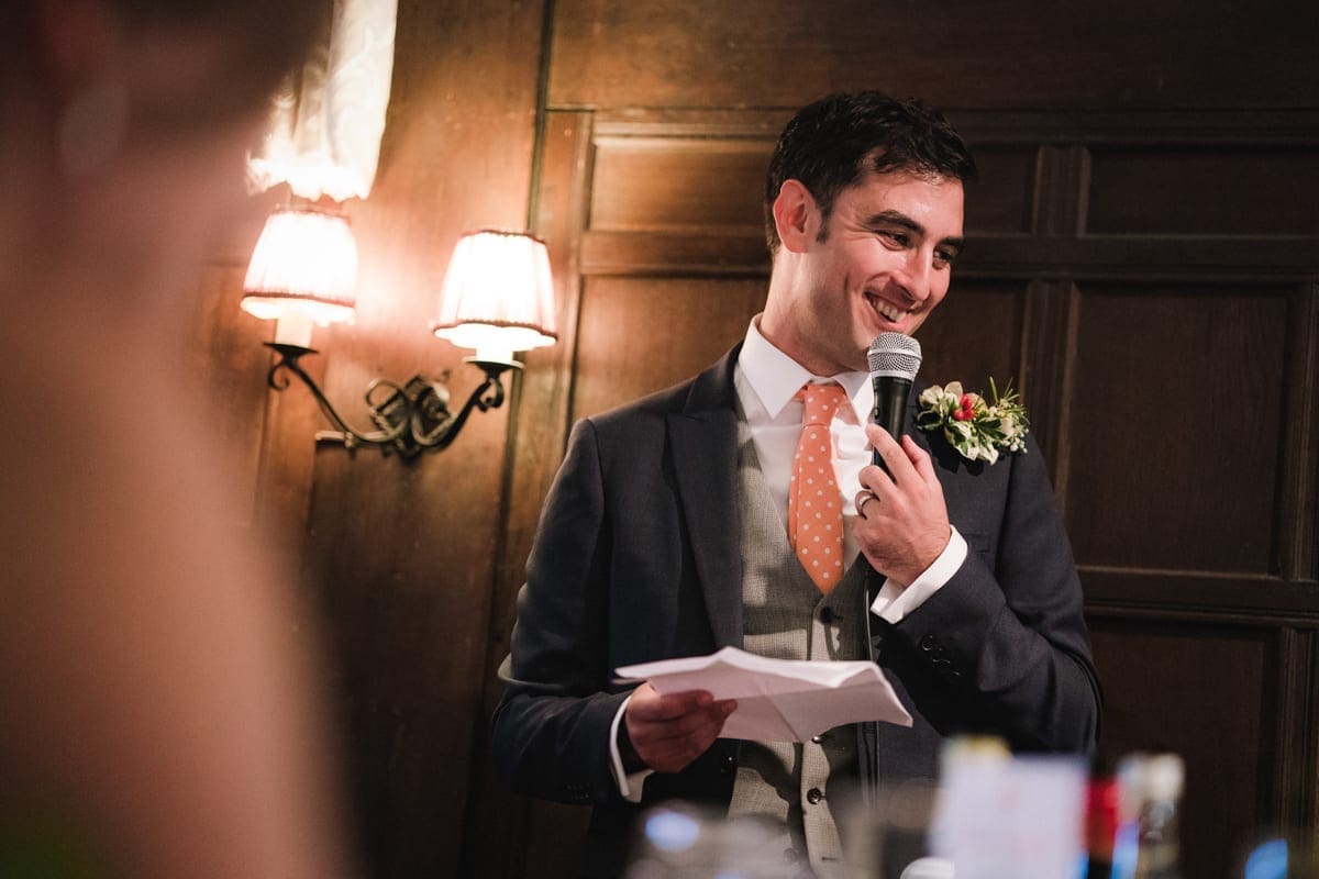 the groom gives his speech recorded in their wedding video