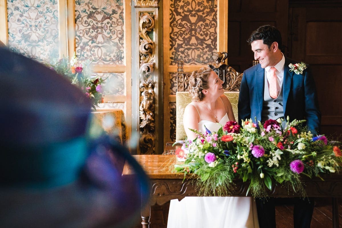 signing the wedding register as husband and wife