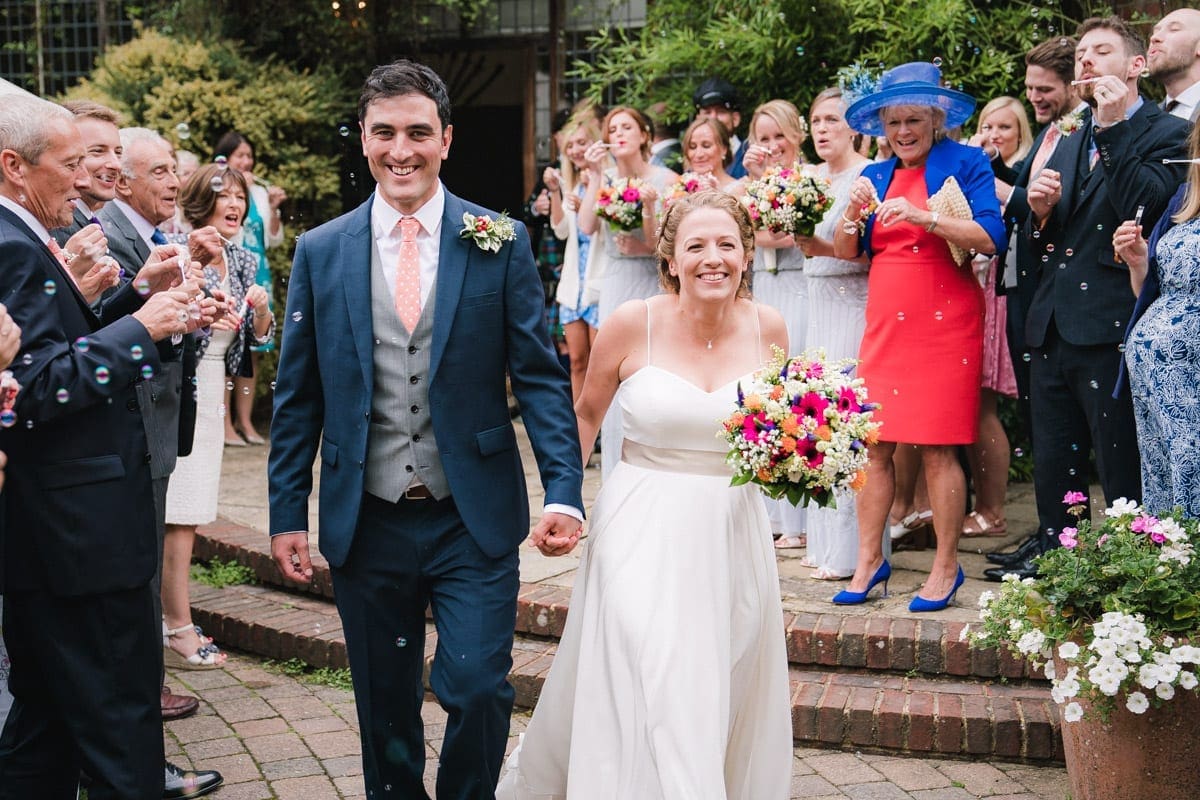 wedding confetti bubbles captured on video and photo at Ramster Hall in Surrey