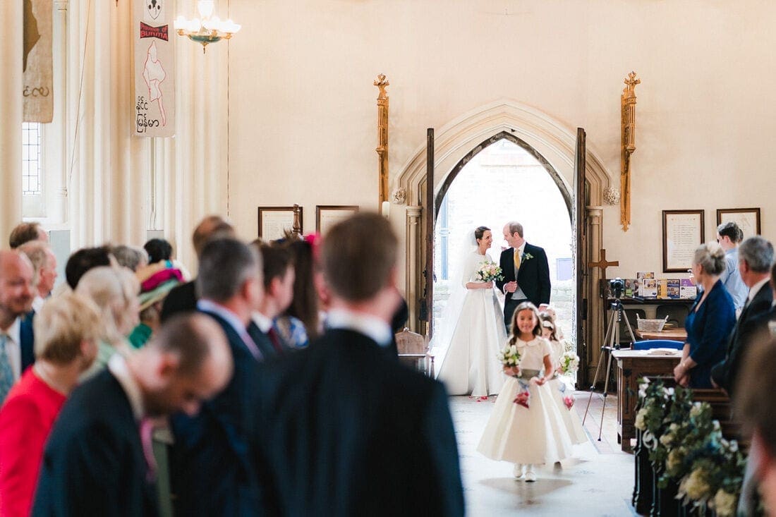 waiting to walk up the aisle to be married